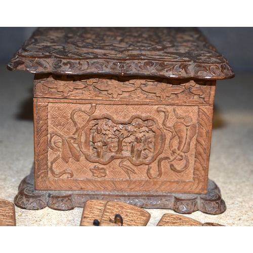 1059 - An Asian Carved Wooden Puppet Head together with a Carved Wooden Box, a Carved Wooden Fan and a Ston... 