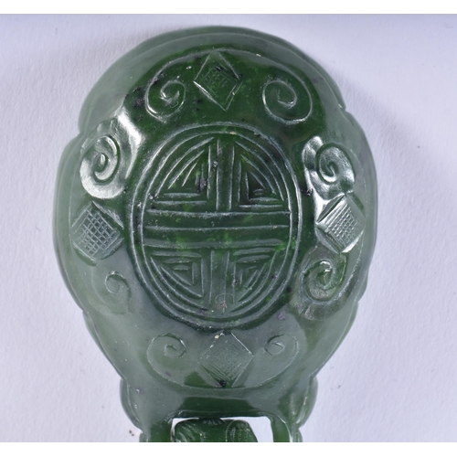 1067 - AN 18TH/19TH CENTURY CHINESE CARVED SPINACH JADE BELT HOOK Late Qianlong/Jiaqing. 14 cm wide.