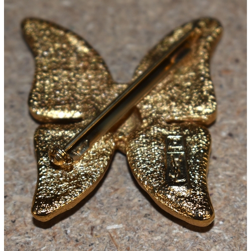 1100 - Gold tone enamel butterfly brooch by designer Yves Saint Laurent.  Stamped YSL, 5cm x 4.5cm, weight ... 