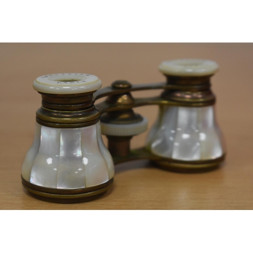 1181 - A PAIR OF MOTHER OF PEARL OPERA GLASSES. 10 cm x 8 cm.