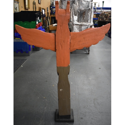 604 - A NORTH AMERICAN PAINTED WOOD TOTEM POLE. 100 cm x 60 cm.