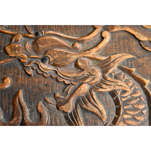 607 - A LATE 19TH/20TH CENTURY CHINESE CARVED WOOD DRAGON CHEST Late Qing. 85 cm x 45 cm.