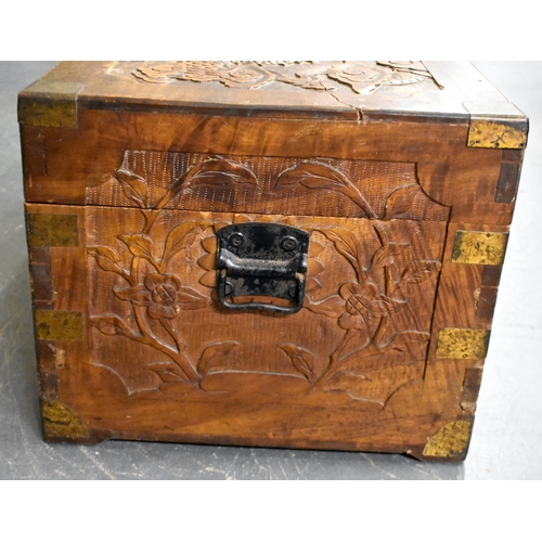 607 - A LATE 19TH/20TH CENTURY CHINESE CARVED WOOD DRAGON CHEST Late Qing. 85 cm x 45 cm.