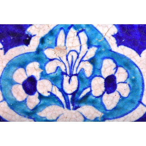 608 - A LARGE MIDDLE EASTERN MULTAN MOSQUE TILE. 34 cm x 28 cm.