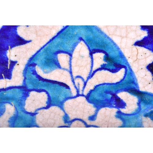 608 - A LARGE MIDDLE EASTERN MULTAN MOSQUE TILE. 34 cm x 28 cm.