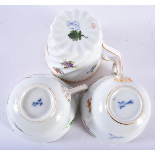 611 - TWO MEISSEN CUPS AND SAUCERS together with a dresden cup and saucer. (6)