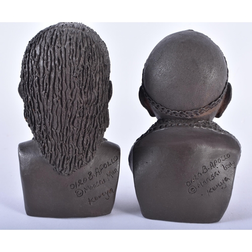 614 - A PAIR OF AFRICAN KENYAN CERAMIC BUSTS OF A MAASAI LADY AND GENTLEMAN by Apollo. 13 cm high.