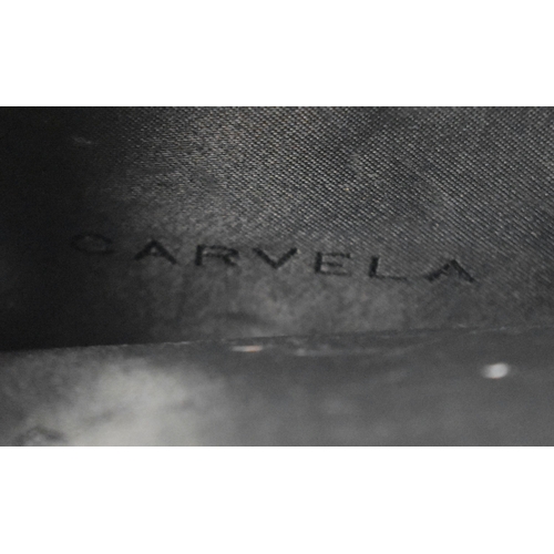 617 - THREE DESIGNER CARVELLA LEATHER HANDBAGS. (3)