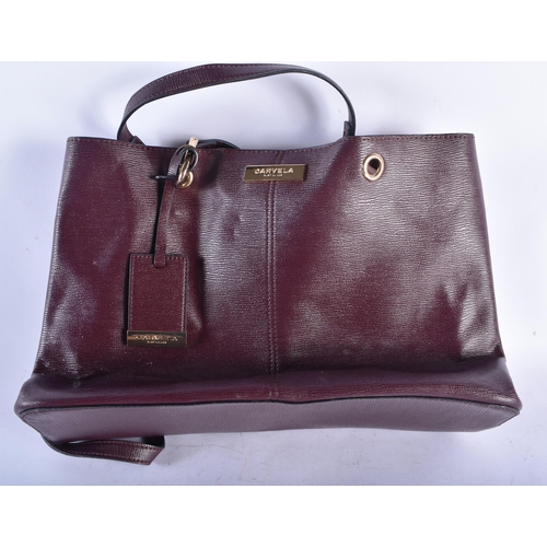 617 - THREE DESIGNER CARVELLA LEATHER HANDBAGS. (3)