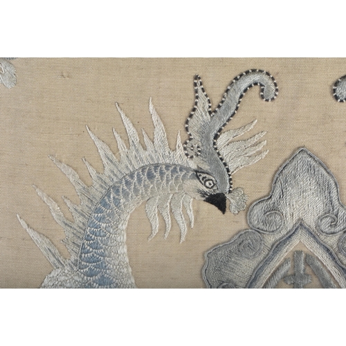 622 - A 19TH CENTURY CHINESE FRAMED AND EMBROIDERED DOUBLE BIRD PANEL Qing. 66 cm square.