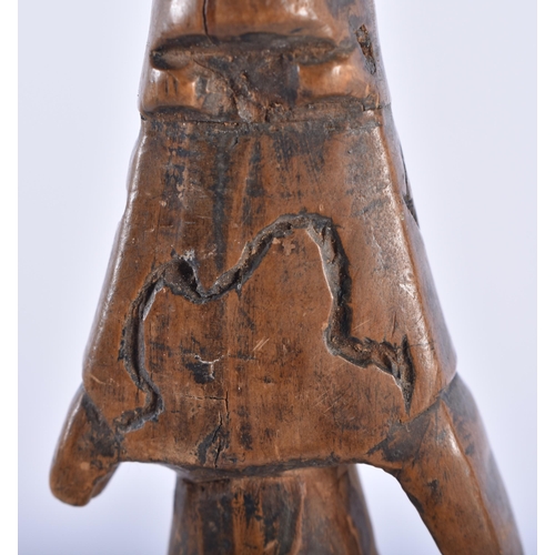 624 - AN AFRICAN TRIBAL CARVED WOOD FERTILITY PULLEY. 24 cm high.