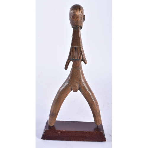 624 - AN AFRICAN TRIBAL CARVED WOOD FERTILITY PULLEY. 24 cm high.