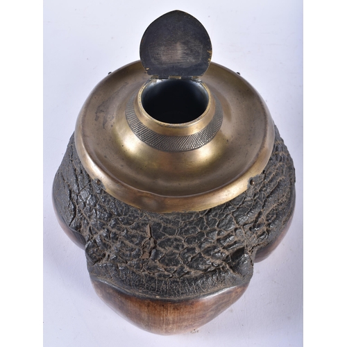 629 - A LOVELY 19TH CENTURY COUNTRY HOUSE ELEPHANT FOOT INKWELL of naturalistic form. 21 cm x 21 cm.