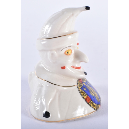 631 - AN UNUSUAL CRESTED WARE PUNCH JESTER FIGURE. 9 cm x 7.5 cm.