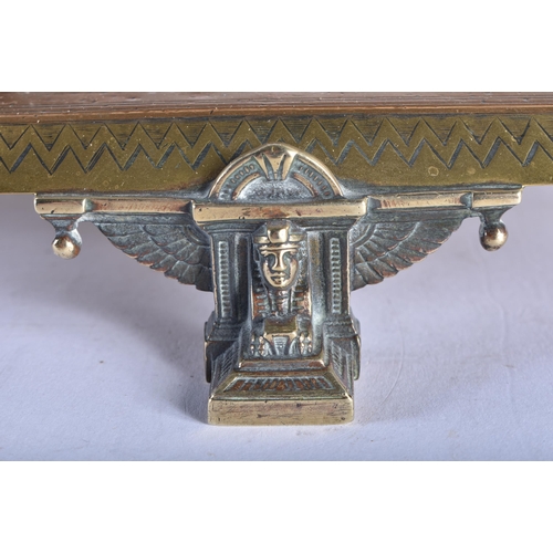 636 - A LOVELY LARGE 19TH CENTURY ENGLISH EGYPTIAN REVIVAL DESK STAND formed with a recumbent sphinx, upon... 