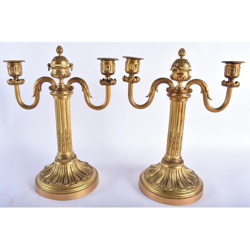 638 - A FINE PAIR OF 19TH CENTURY FRENCH ORMOLU TWIN BRANCH CANDLESTICKS with scrolling arms wrapped in ac... 