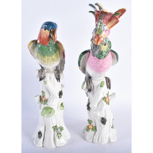 639 - A LOVELY PAIR OF 19TH CENTURY GERMAN PORCELAIN FIGURES OF PARROTS modelled with brightly coloured pl... 