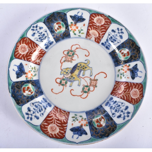 642 - AN UNUSUAL PAIR OF 19TH CENTURY JAPANESE MEIJI PERIOD IMARI PLATES painted with buddhistic lions. 21... 