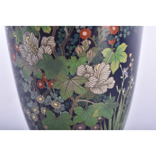 648 - A 19TH CENTURY JAPANESE MEIJI PERIOD CLOISONNE ENAMEL VASE decorated with foliage. 18 cm high.