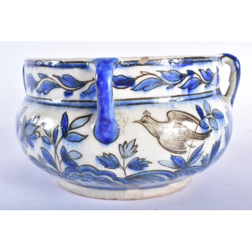 658 - A RARE 18TH CENTURY MIDDLE EASTERN SAFAVID POURING BOWL with three loop handles, painted with birds ... 