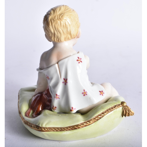 663 - AN UNUSUAL ANTIQUE GERMAN PORCELAIN FIGURE OF A YOUNG CHILD modelled playing with a dog. 10 cm x 10 ... 