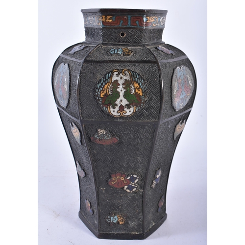 671 - A 19TH CENTURY CHINESE CHAMPLEVE ENAMEL AND BRONZE VASE Qing, decorated with birds and emblems. 28 c... 