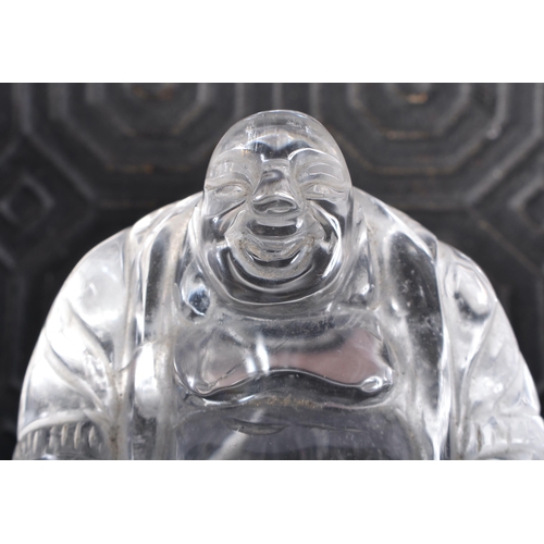 675 - A LATE 19TH CENTURY CHINESE CARVED ROCK CRYSTAL FIGURE OF A BUDDHA Late Qing. 5 cm x 5 cm.