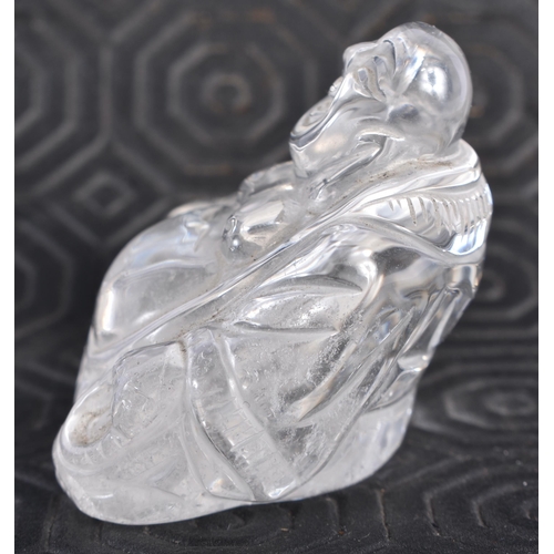 675 - A LATE 19TH CENTURY CHINESE CARVED ROCK CRYSTAL FIGURE OF A BUDDHA Late Qing. 5 cm x 5 cm.