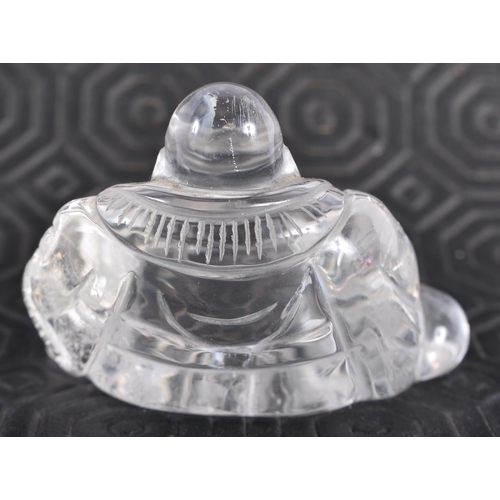 675 - A LATE 19TH CENTURY CHINESE CARVED ROCK CRYSTAL FIGURE OF A BUDDHA Late Qing. 5 cm x 5 cm.