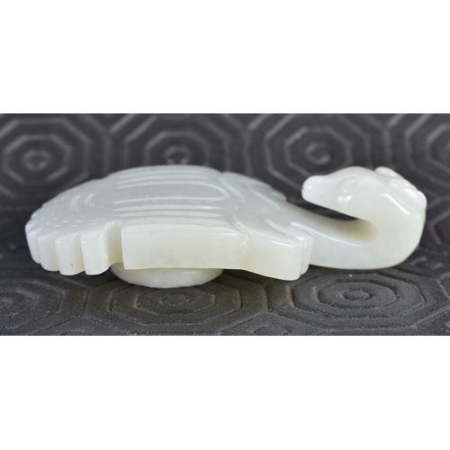 676 - A 19TH CENTURY CHINESE CARVED GREENISH WHITE JADE BELT HOOK Late Qing. 6.5 cm x 3.5 cm.