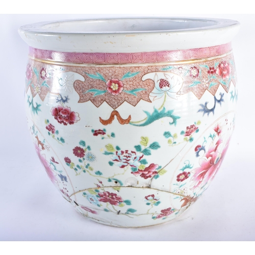 683 - A LARGE CHINESE QING DYNASTY FAMILLE ROSE PORCELAIN JARDINIERE painted with bold pink enamels. 35 cm... 