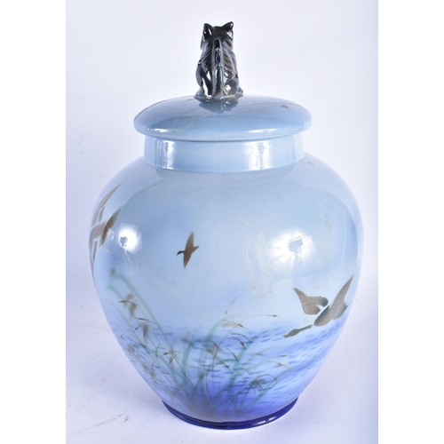 684 - A RARE LARGE SYLVAC CERAMIC VASE AND COVER painted with birds in flight. 36 cm x 20 cm.