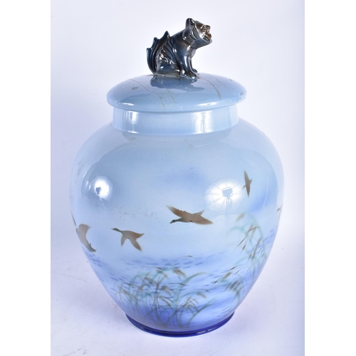 684 - A RARE LARGE SYLVAC CERAMIC VASE AND COVER painted with birds in flight. 36 cm x 20 cm.