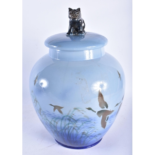 684 - A RARE LARGE SYLVAC CERAMIC VASE AND COVER painted with birds in flight. 36 cm x 20 cm.