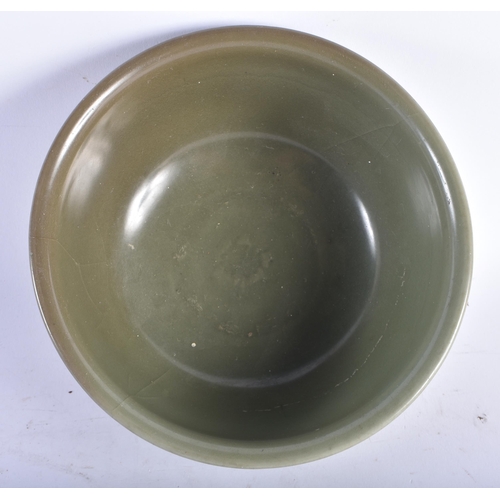 688 - A CHINESE MING DYNASTY LONGQUAN CELADON BOWL. 21 cm wide.