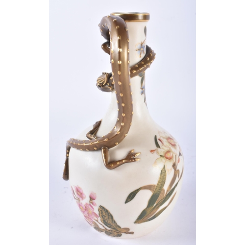 700 - A LOVELY ROYAL WORCESTER BLUSH IVORY PORCELAIN JUG with wrapped chilong dragon handle. 23.5 cm high.