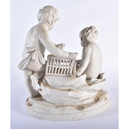 709 - AN ANTIQUE FRENCH PARIAN WARE PORCELAIN FIGURAL GROUP modelled as a boy and girl beside a bird cage.... 