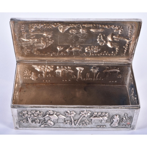 713 - A FINE 19TH CENTURY INDIAN SILVER DRESSING TABLE SET decorated in relief with figures within landsca... 