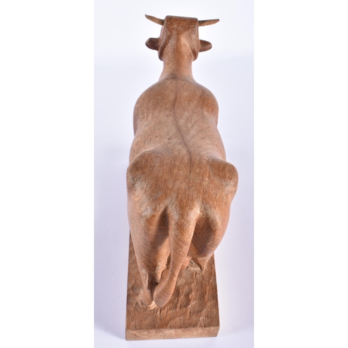 715 - AN ENGLISH CARVED WOOD FIGURE OF A BULL possibly from one of the Yorkshire Critters workshop. 24 cm ... 