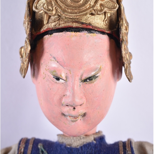 730 - A LATE 19TH CENTURY CHINESE SILK EMBROIDERED THEATRE DOLL. 27 cm long.