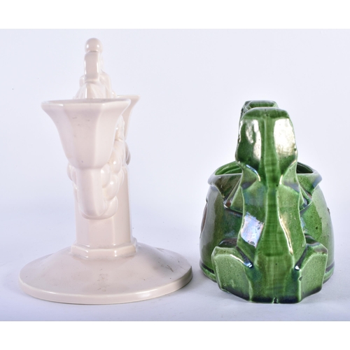 732 - AN ART DECO POOLE POTTERY CANDLESTICK together with a green glazed art deco vessel. Largest 15.5 cm ... 