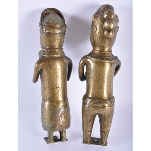 746 - A PAIR OF ANTIQUE AFRICAN TRIBAL BRONZE FIGURES. 18 cm high.