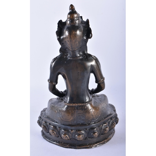 747 - AN ANTIQUE CHINESE TIBETAN INDIAN BRONZE FIGURE OF A SEATED BUDDHA possibly representing Amitayus. 1... 