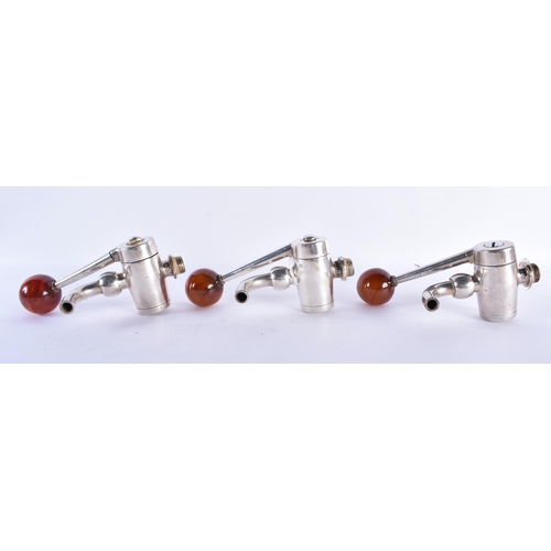 751 - A SET OF VINTAGE BAKELITE AMBER TYPE CHROME BAR TAPS. Each 18 cm x 8 cm, each ball 4.25 cm diameter.... 