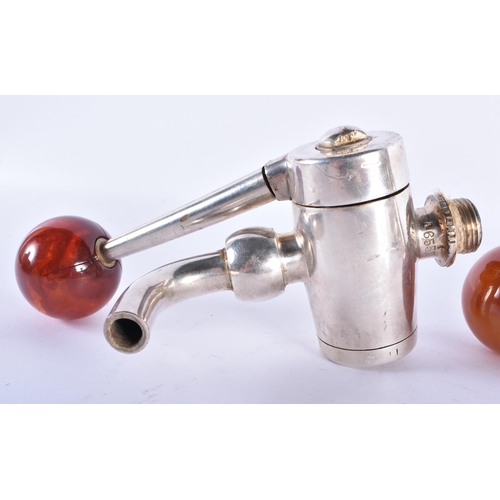 751 - A SET OF VINTAGE BAKELITE AMBER TYPE CHROME BAR TAPS. Each 18 cm x 8 cm, each ball 4.25 cm diameter.... 