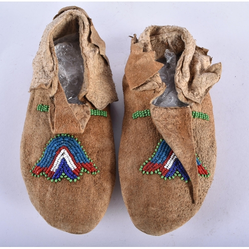 752 - A PAIR OF NORTH AMERICAN TRIBAL BEADWORK SHOES together with an inlaid wood puffin box & a Chinese i... 