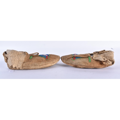 752 - A PAIR OF NORTH AMERICAN TRIBAL BEADWORK SHOES together with an inlaid wood puffin box & a Chinese i... 