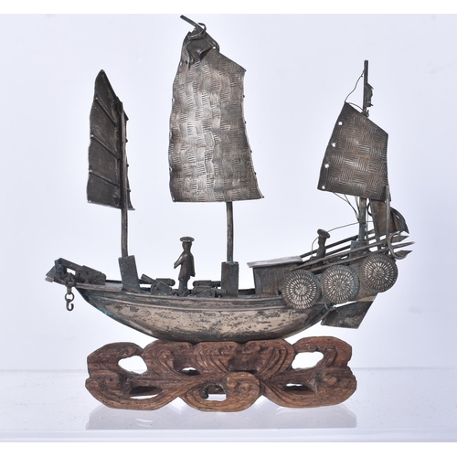 810 - A Chinese Export Silver MOdel of a Junk on a Carved Wood Stand.  Stamped 900.  11cm x 9.8cm x 4.2cm,... 