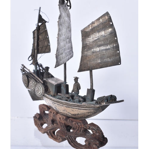 810 - A Chinese Export Silver MOdel of a Junk on a Carved Wood Stand.  Stamped 900.  11cm x 9.8cm x 4.2cm,... 