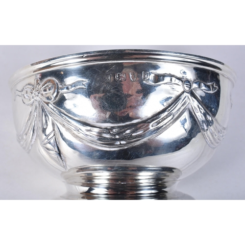 818 - A Victorian Silver Bowl with Ribbon Decoration.  Hallmarked London 1850.  6.6cm x 11.6cm, weight 148... 